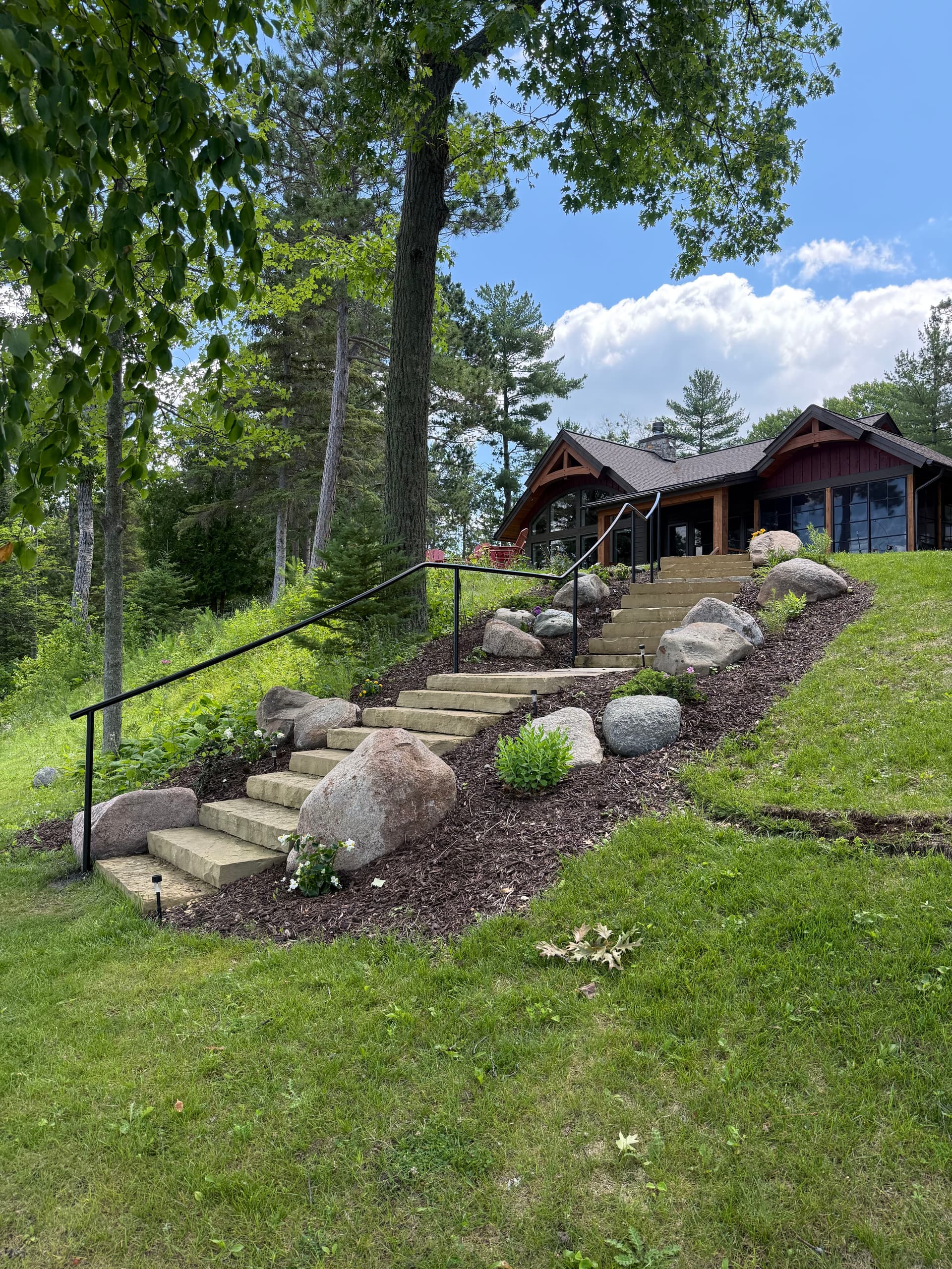 Custom Welded Handrails Built for a Longville Lakeside Staircase image